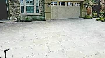 Clean sealed concrete driveway after stain removal