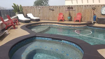 Pool deck surface after repair and sealing