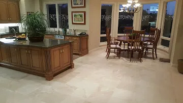 Refinished hardwood floor in a restored living room