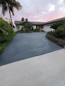 Stamped concrete driveway after restoration and sealing