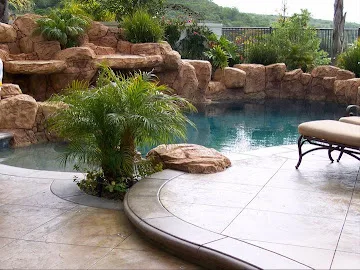Restored travertine pool surround for a Laguna Niguel home